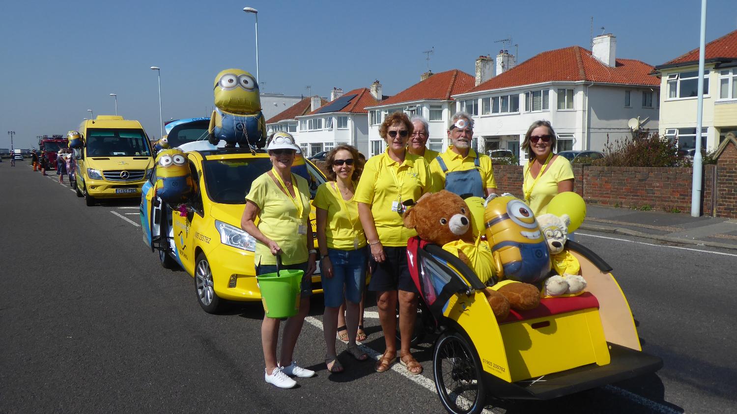 group of SSW staff and volunteers dressed up in a parade