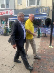 Tim Loughton MP being shown down Warwick Street in visual impairment sim specs
